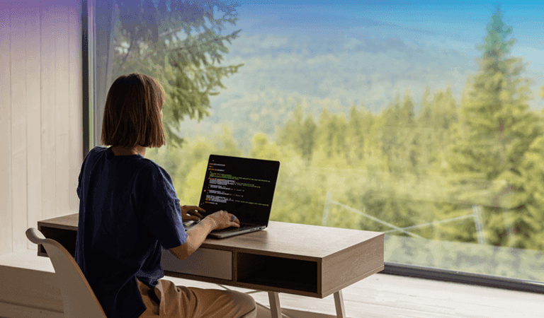 A girl sitting at a desk working alone